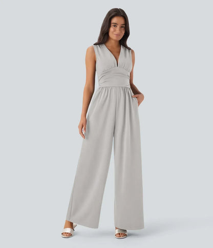 ColaSuit™ | Sleeveless party jumpsuit with V‑neck, side pockets and invisible zip (Easy Peezy)